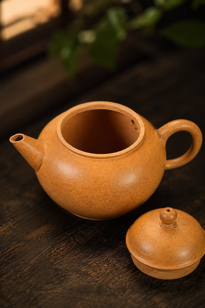 Yixing teapot for light oolong guide with Handmade Shuiping Yixing Zisha Teapot – Golden Duanni Clay, 90ml