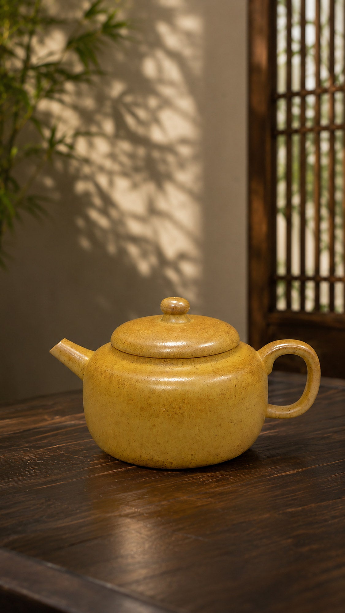 Benshan Luni Dezhong teapot in warm bamboo-filtered light
