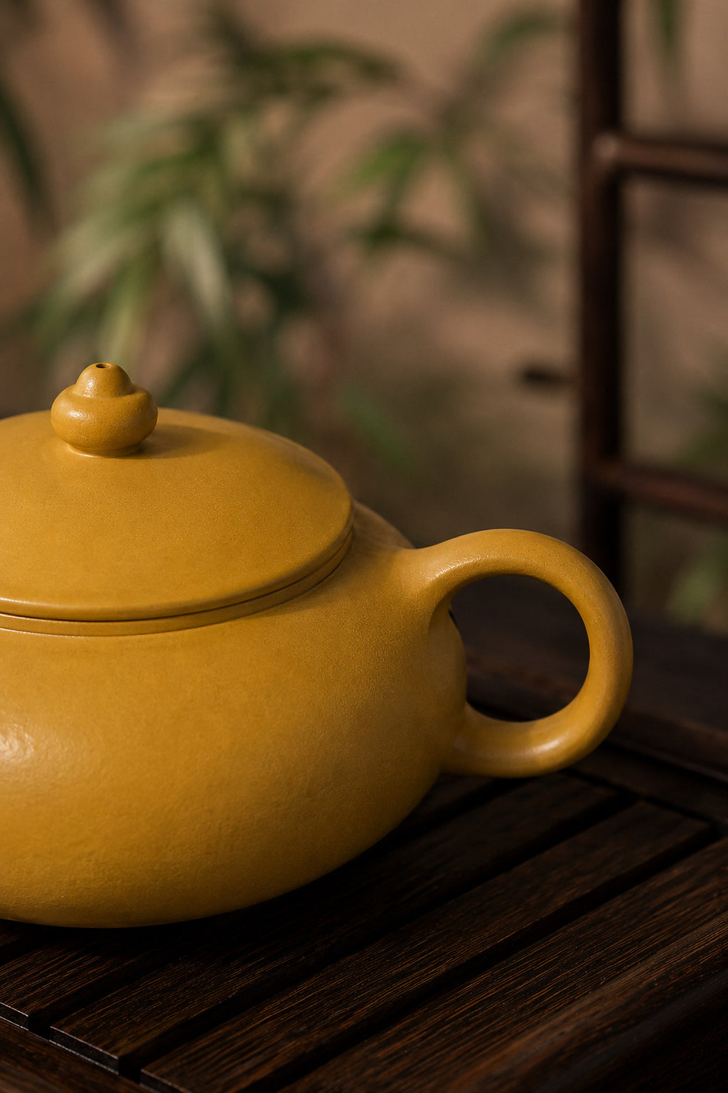 Han Jiang Yixing teapot in golden Zhuni, close-up of loop handle and lid