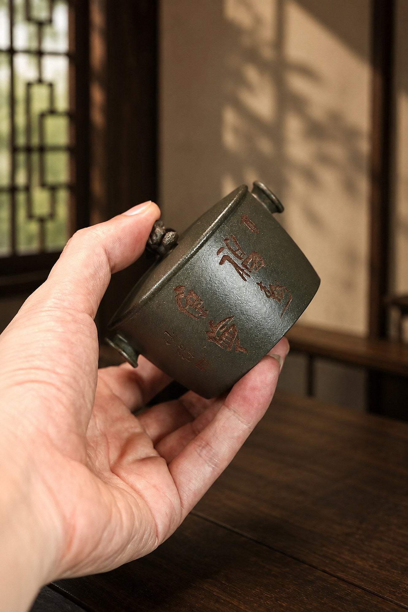Product view 2 of 130ml Hand-Grip Form zisha teapot in Golden Duanni Clay, No. 385