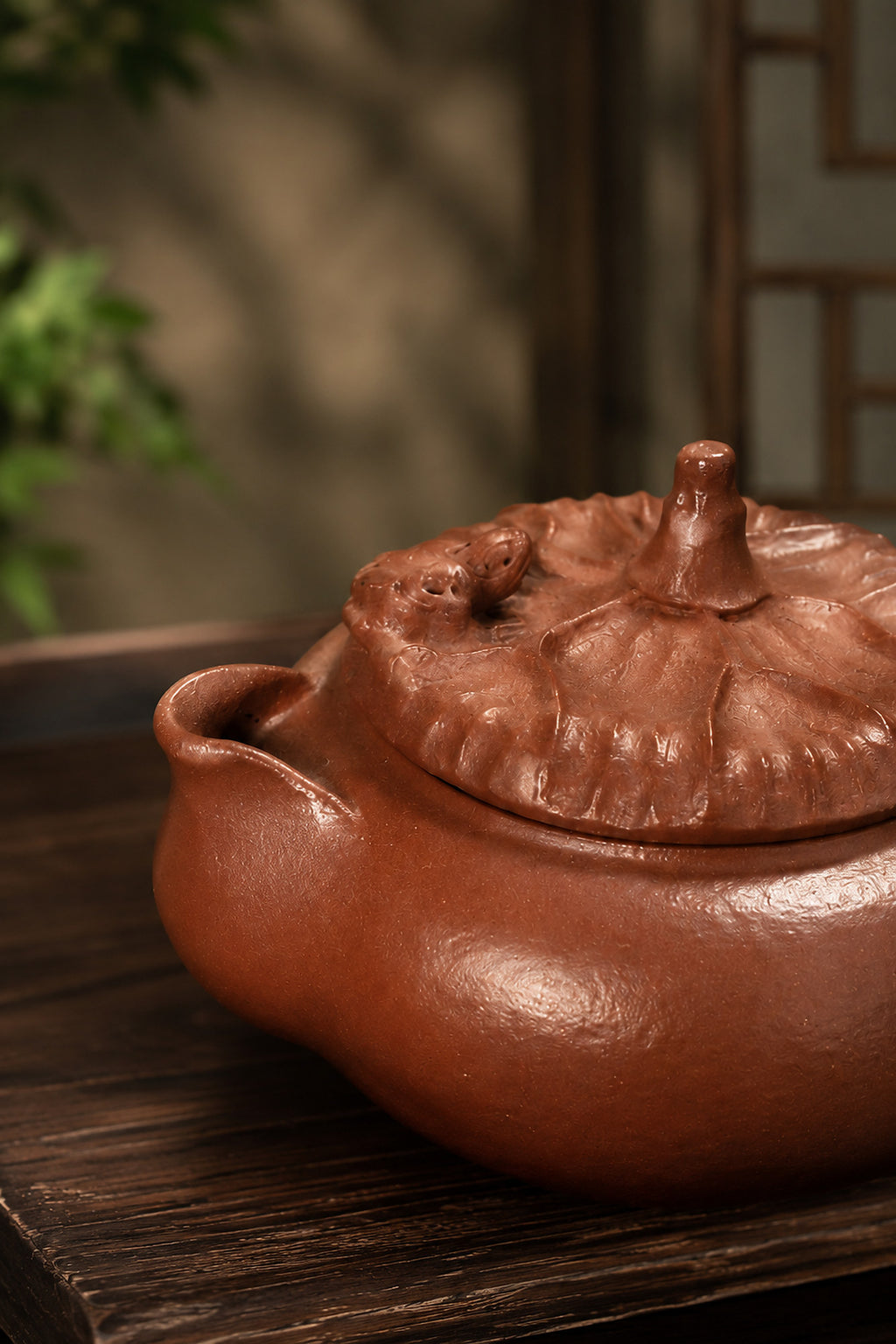 Hand-grip Yixing teapot in Jiangponi, close-up of spout, lid and textured body