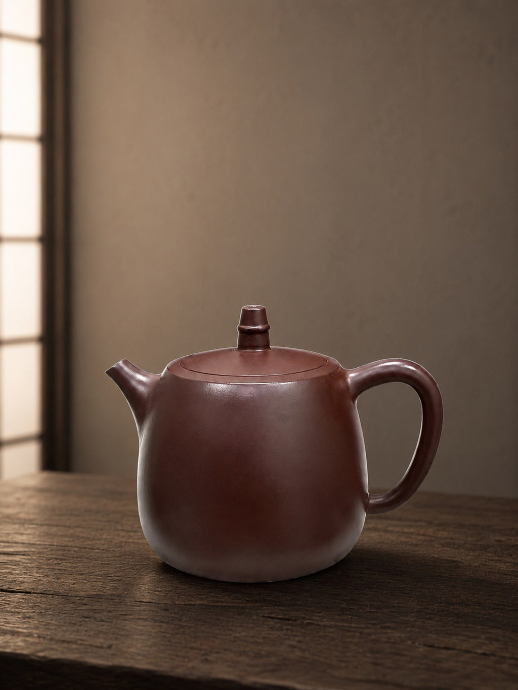 Handuo teapot in Zipao Yusha Clay, full side view of the tall rounded body and upright lid knob