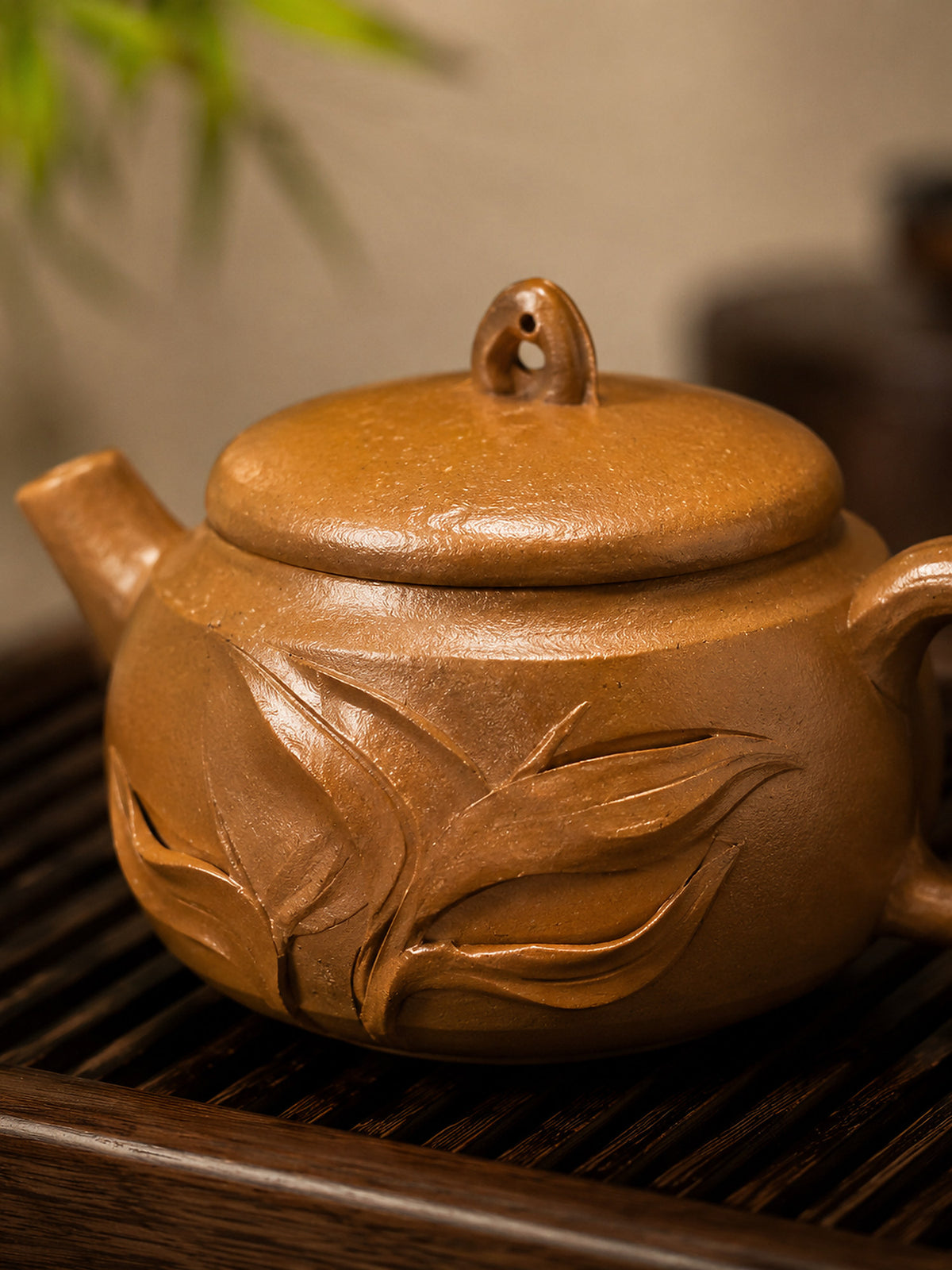 Hanwa Yixing teapot in golden Duanni, close-up of bamboo relief and lid