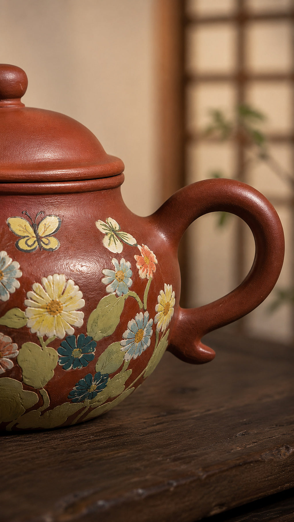 Zhuni Lianzi teapot close-up of floral body and loop handle