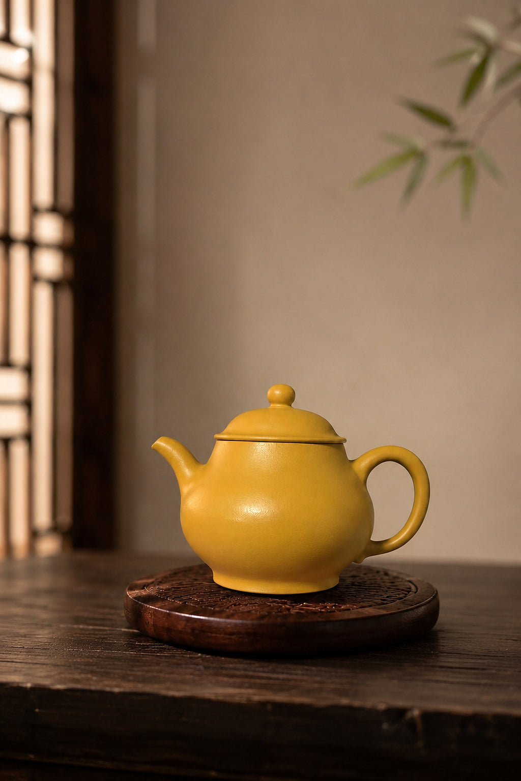 Pan Hu Yixing teapot in golden Zhuni, left profile on a round wooden stand