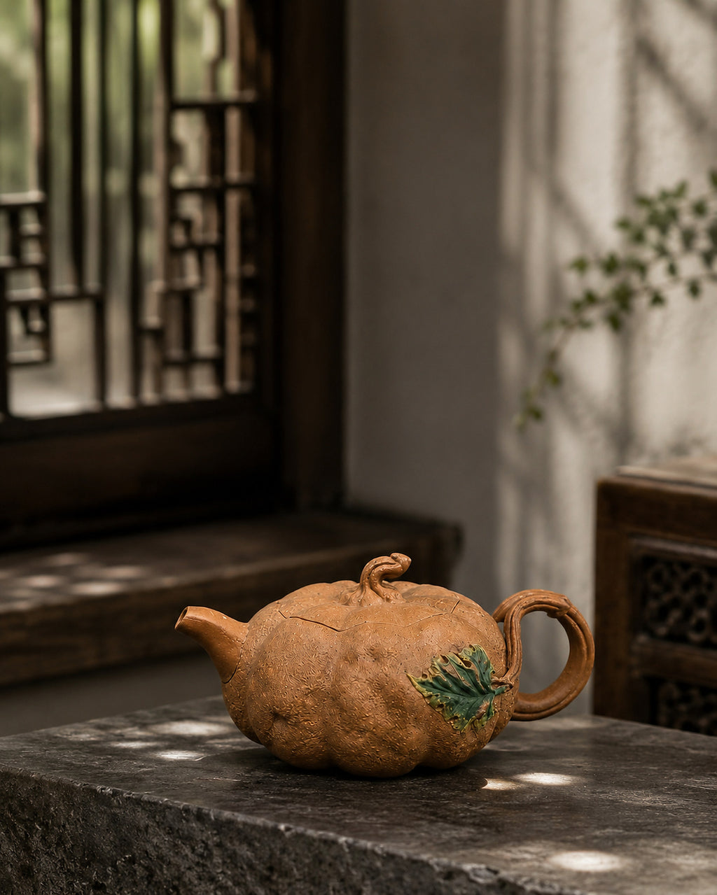 Pumpkin-form Yixing teapot in golden Duanni, left profile in a sunlit interior