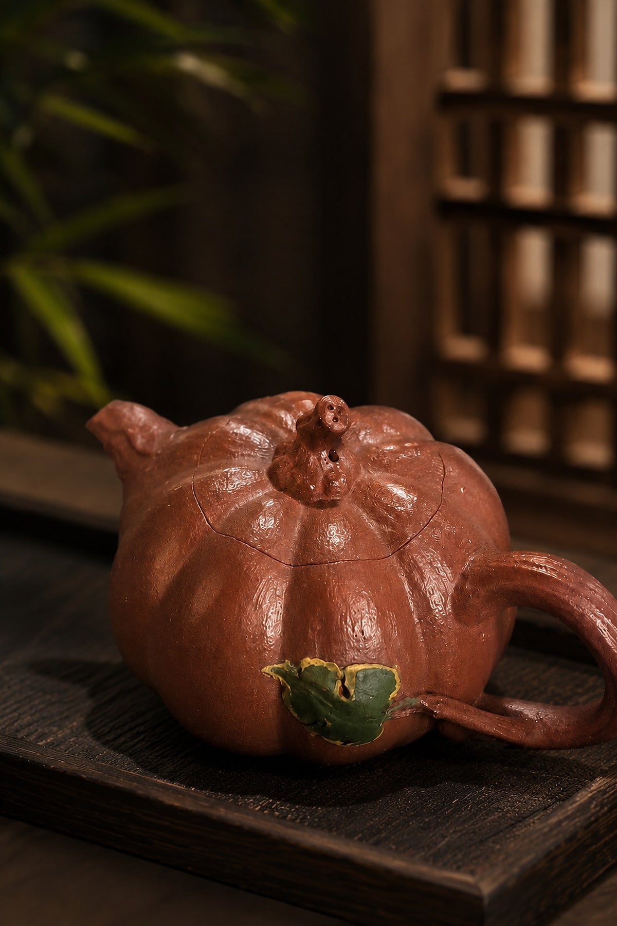 Pumpkin-form Yixing teapot in Jiangponi, close three-quarter view of ribbed body