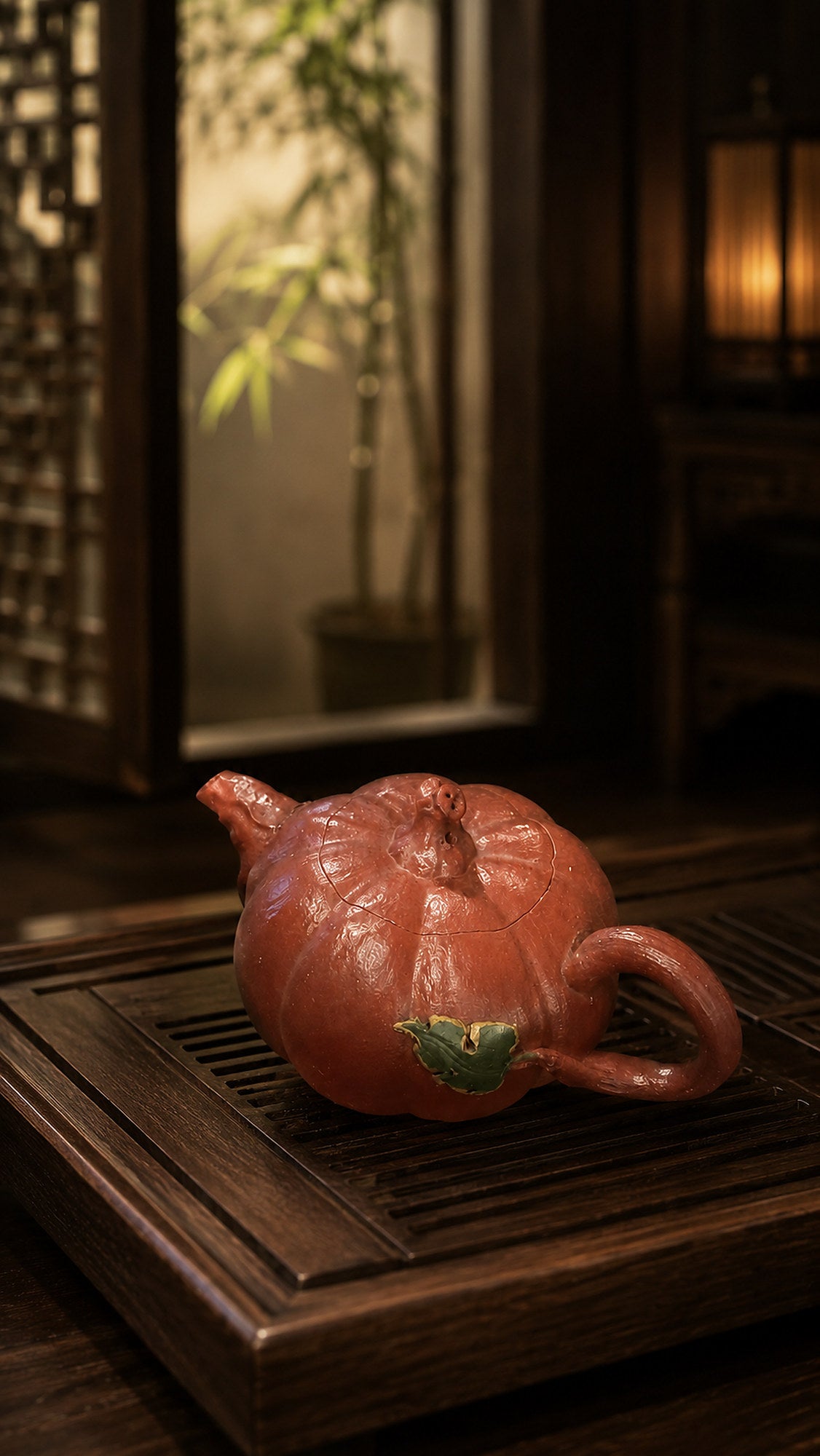Pumpkin-form Yixing teapot in Jiangponi, profile on a wood tea table
