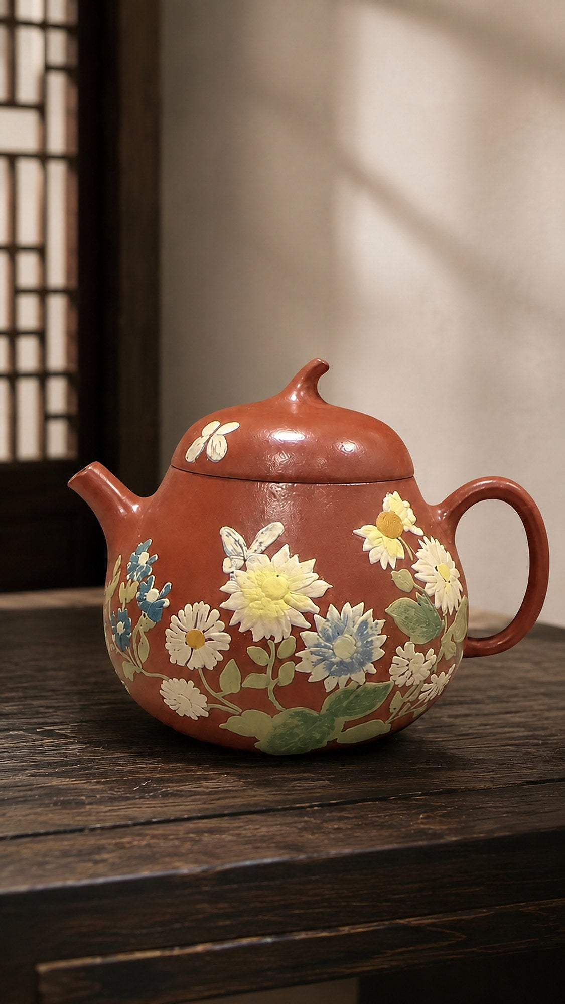 Zhuni Qie Gua teapot, front view of colorful floral pattern