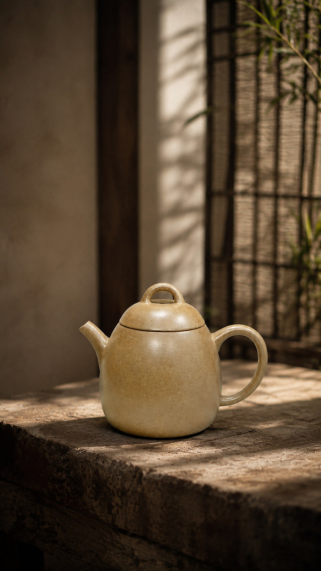 Benshan Luni Qinquan teapot displayed on rough stone