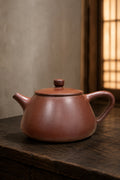 Flat-Lid Shipiao teapot in Zipao Yusha Clay, full side view of the low rounded body and flat lid