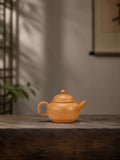 Product view 1 of 90ml Shuiping zisha teapot in Golden Duanni Clay, No. 366
