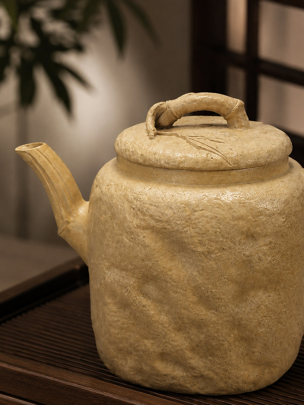 Square Form Yixing teapot in aged Duanni, close front profile of textured square body