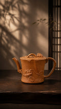 Tree-trunk-form Yixing teapot in yellow Jiangponi, left profile with tree-trunk texture and relief