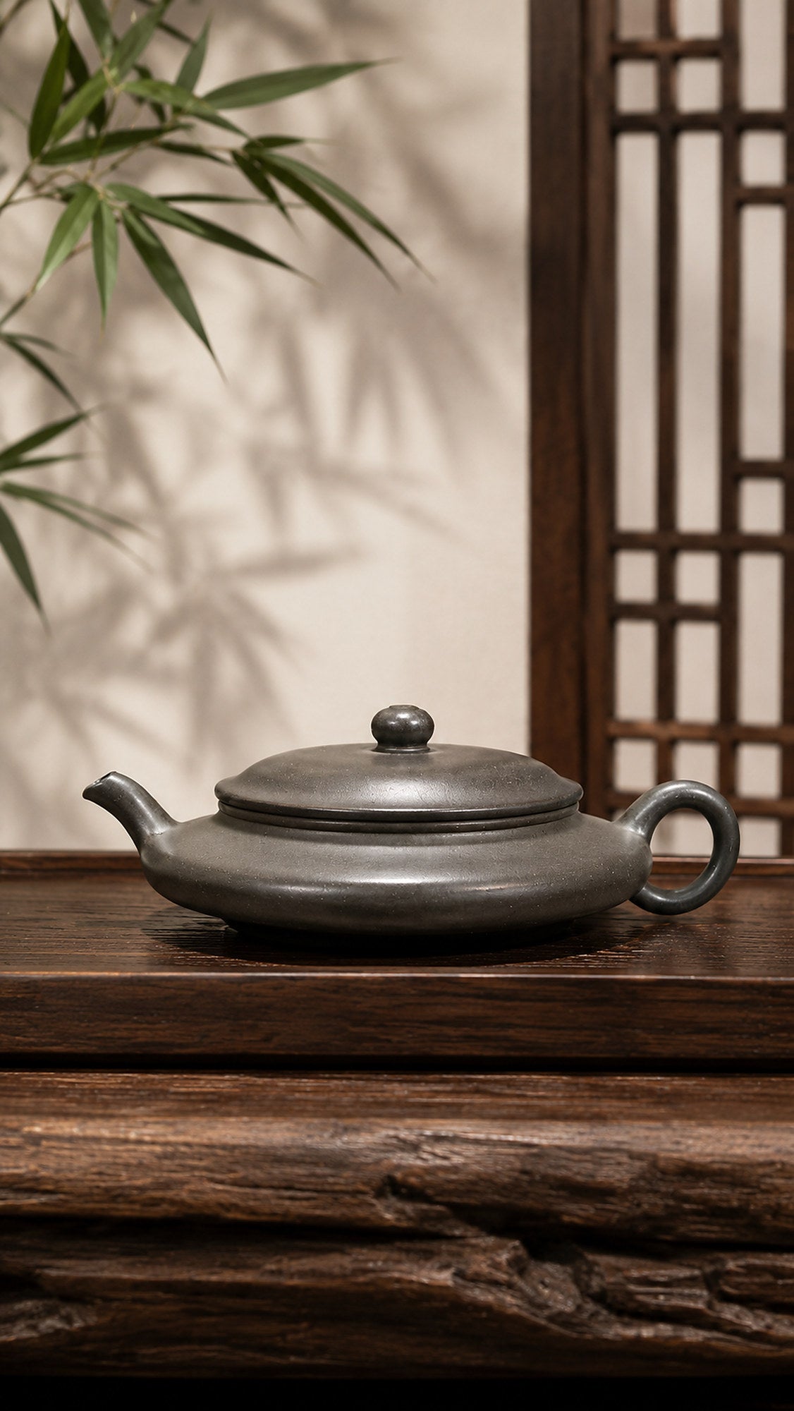 Tianqingni Chao Xu Bian teapot on rustic wood