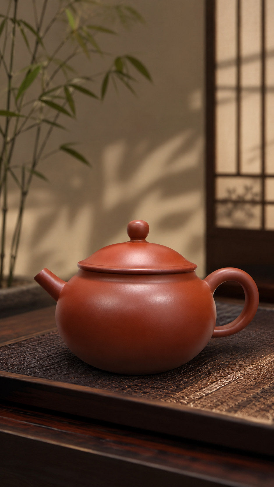 Yuan Bao teapot, full alternate side view on a raised tea tray