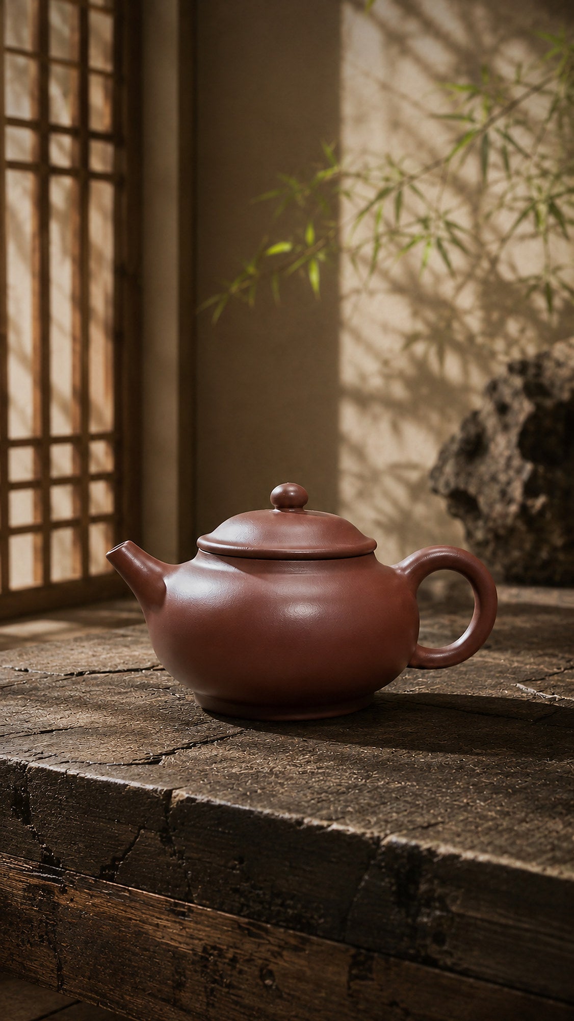 Dicaoqing Zini Yuan Bao teapot on rustic wood
