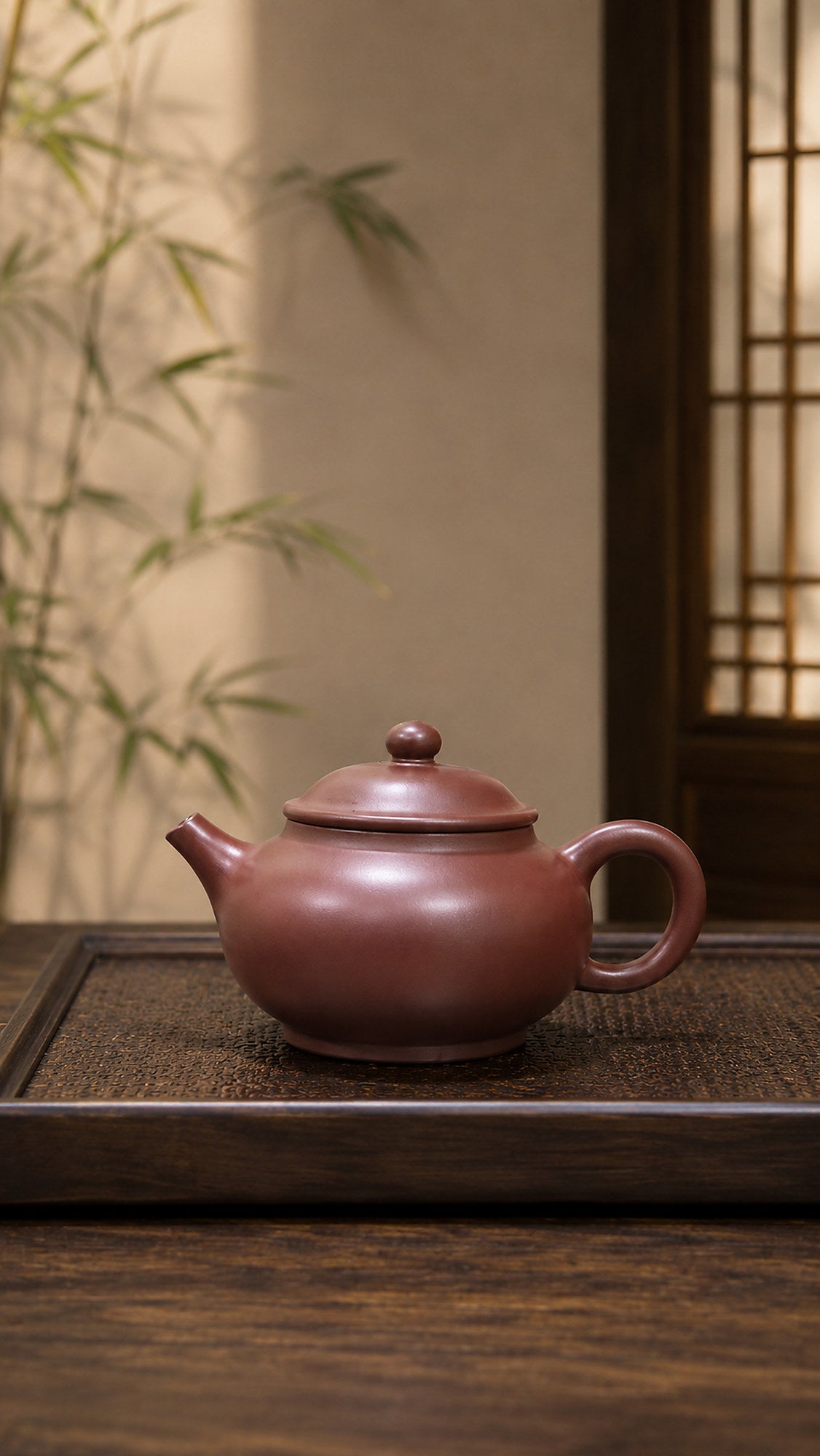 Dicaoqing Zini Yuan Bao Yixing teapot, front-side view